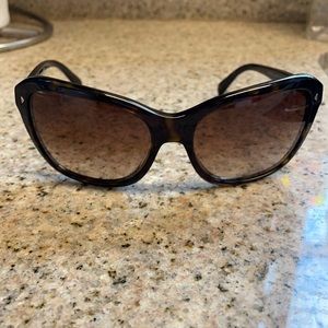 Prada Havana sunglasses. Cat eye. Brown gradient lenses. Tortoise